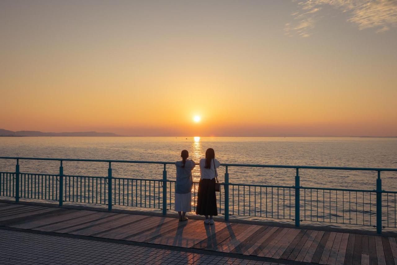 Omo Kansai Airport By Hoshino Resorts Izumisano Buitenkant foto Sunset at the promenade
