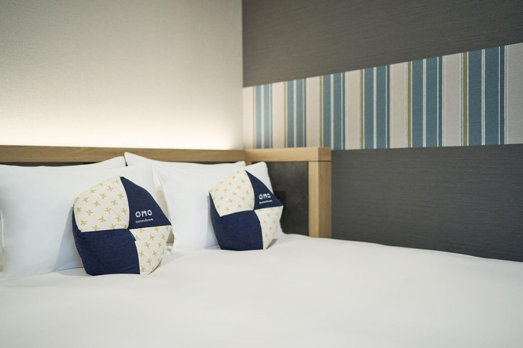 Omo Kansai Airport By Hoshino Resorts Izumisano Buitenkant foto A bed at a hotel